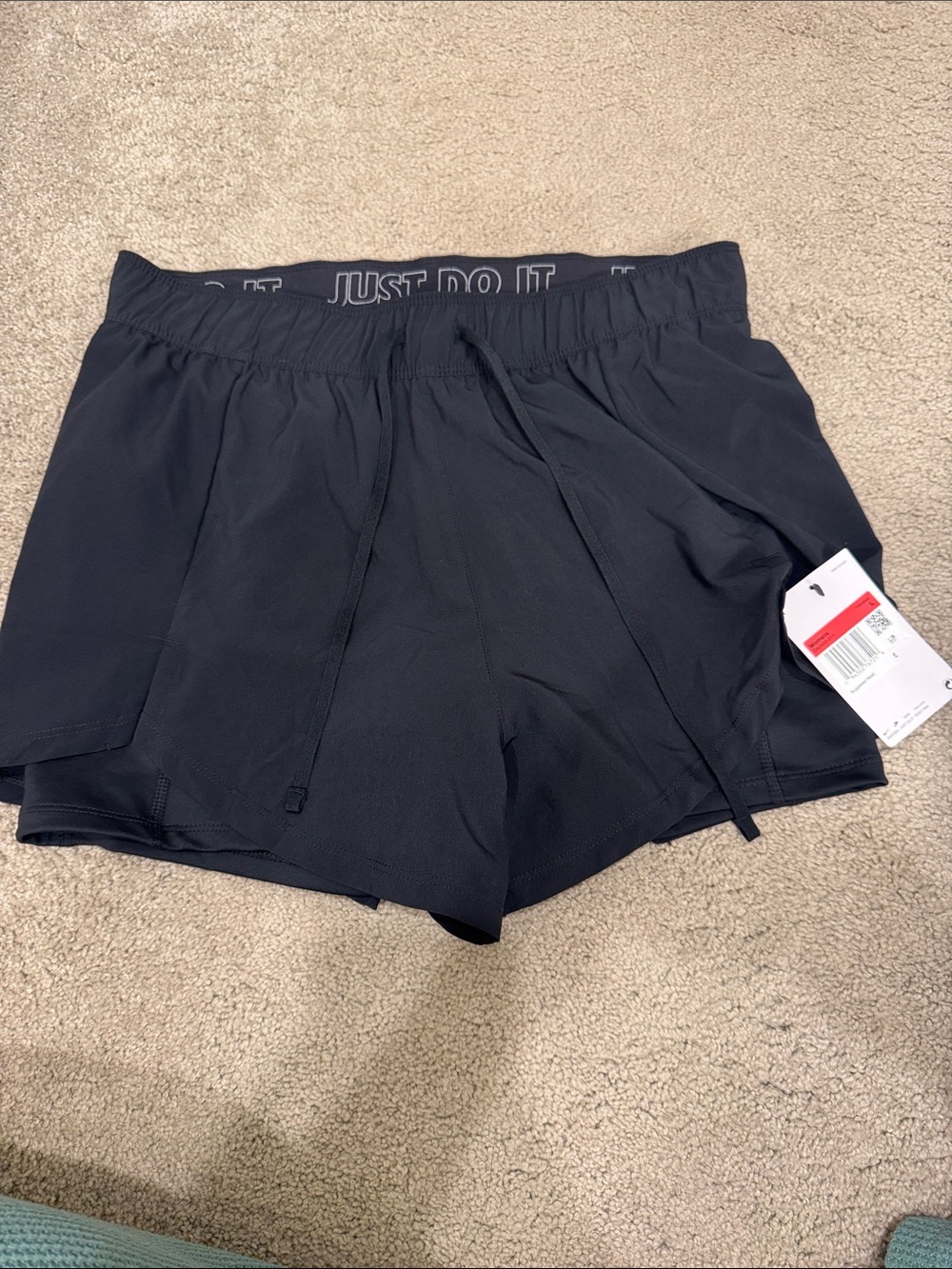 Nike Women's Black Athletic Shorts with 'Just Do It' Waistband